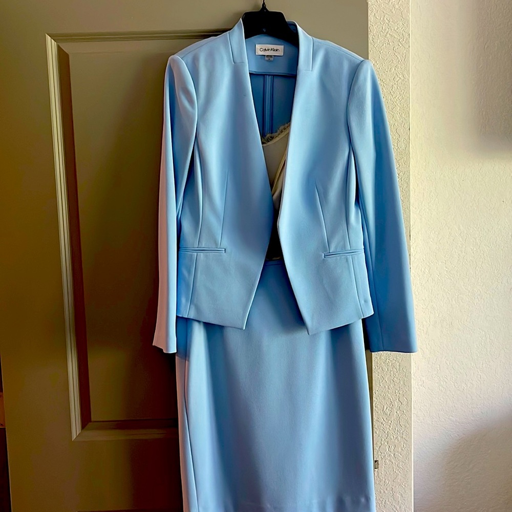 Baby blue suit never worn size 12